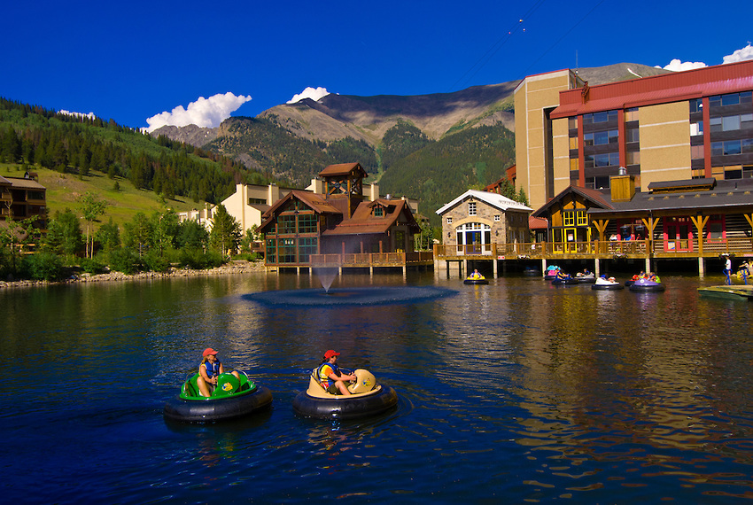 Bumper boats on the pond at Copper Mountain ski resort in summer, Colorado USA